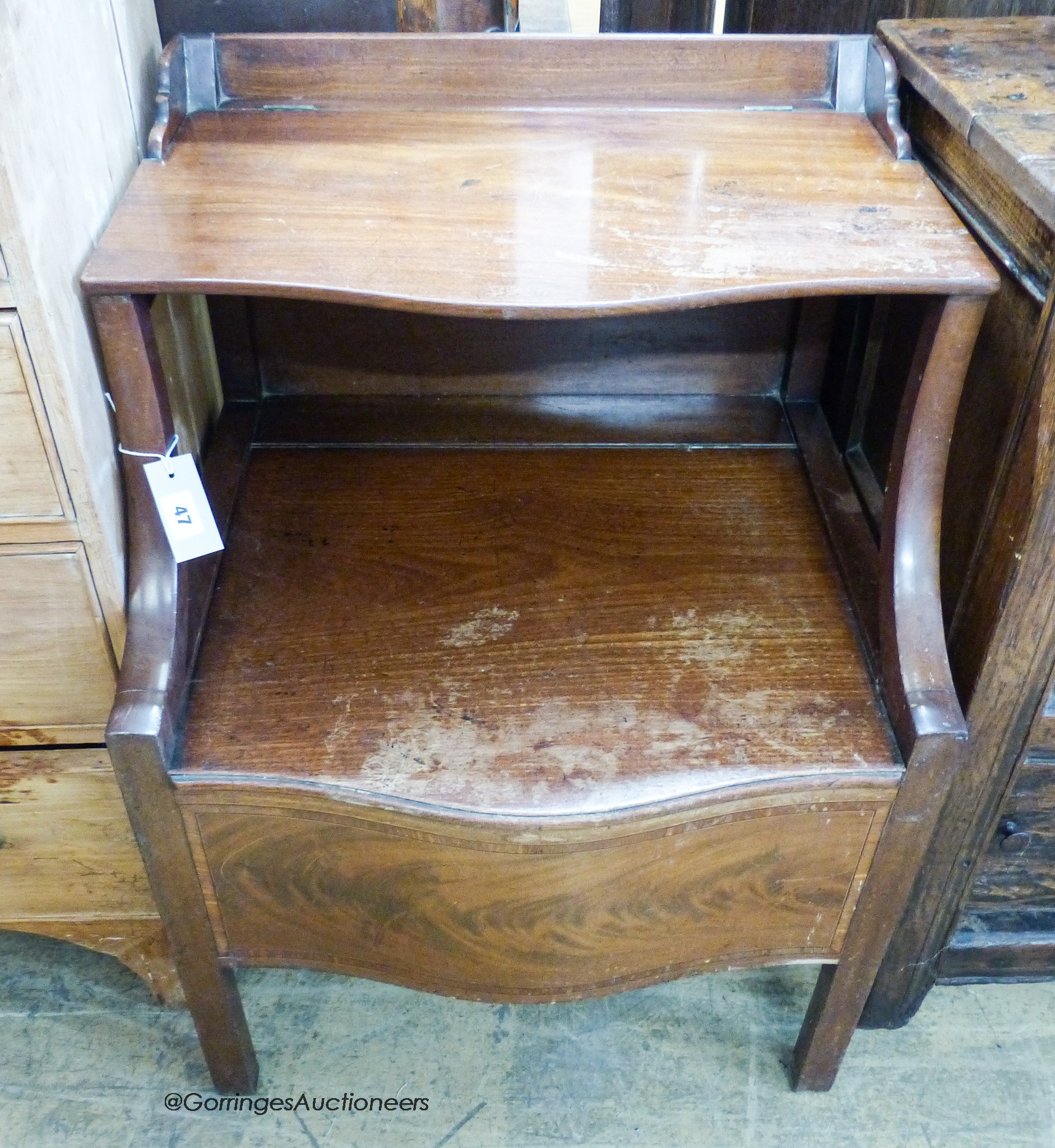 A George III mahogany serpentine front commode, width 58cm, depth 49cm, height 52cm